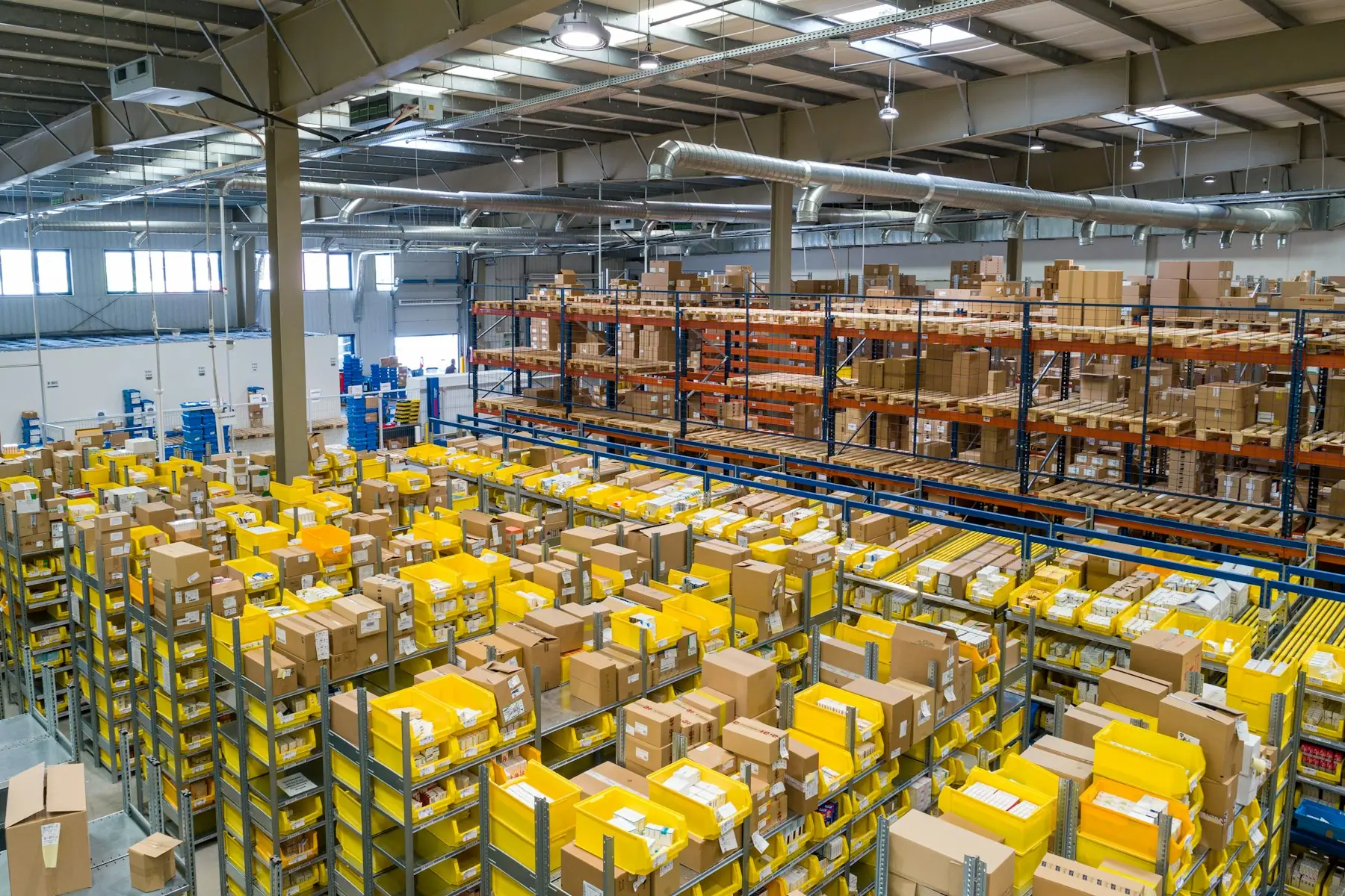 Large warehouse interior with stocked racking